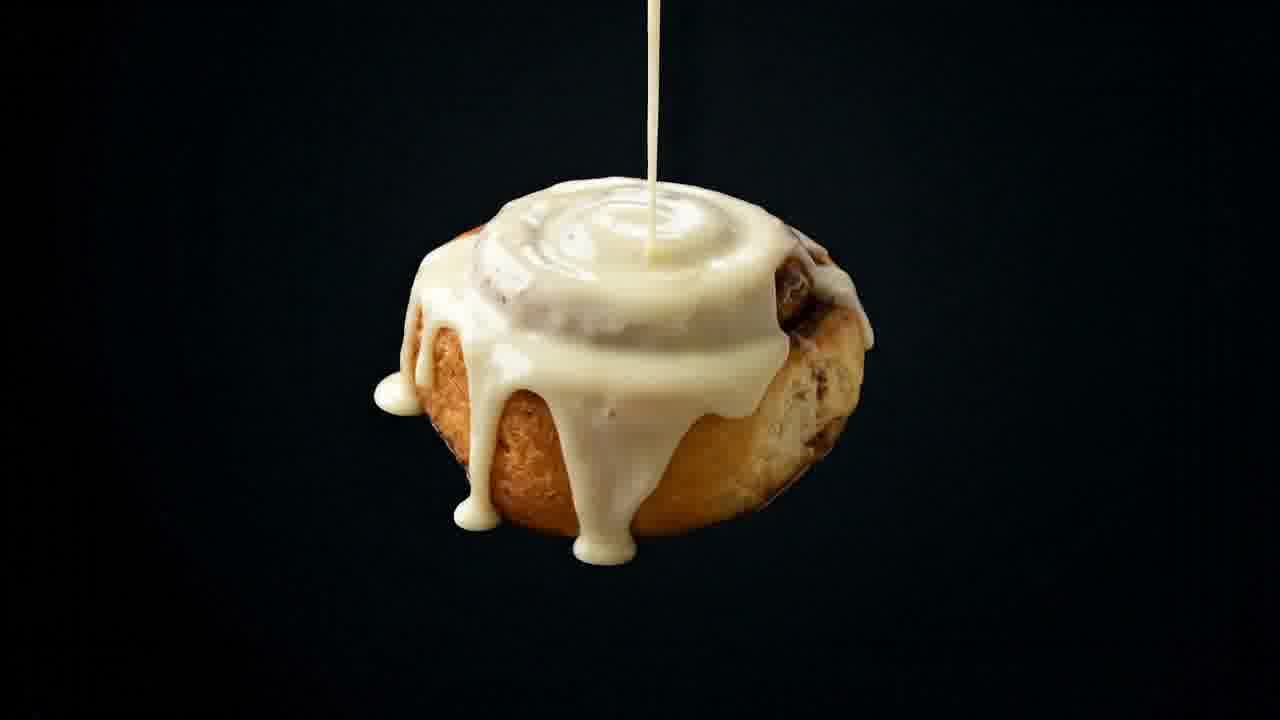 A fully glazed WOMBAKED cinnamon roll